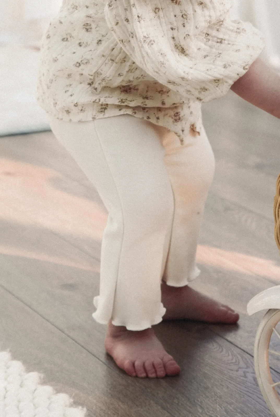 Cream Soft Frill Hem Flare Leggings